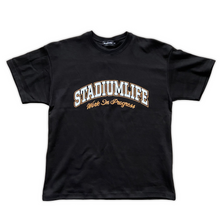 Load image into Gallery viewer, STADIUMLIFE WIP OVERSIZED VARSITY T-SHIRT / BLACK &amp; GOLD
