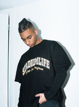 Load image into Gallery viewer, STADIUMLIFE WIP OVERSIZED VARSITY T-SHIRT / BLACK &amp; GOLD
